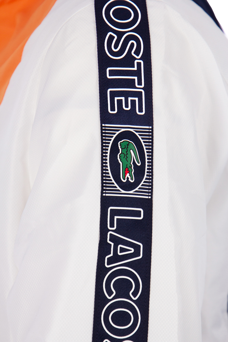 Witte discount lacoste trainingspak